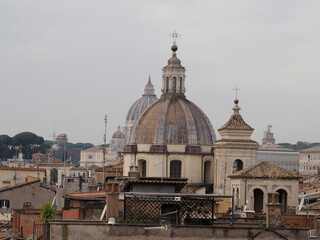 Fototapeta na wymiar rome house roof and church dome cityscape roofdome view panorama
