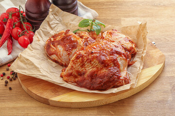 Marinated chicken leg in tomato sauce
