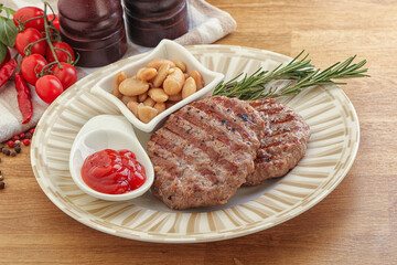 Grilled beef burger cutlet with sauce