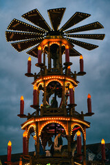 Christmas market food stand with a carousel on the roof