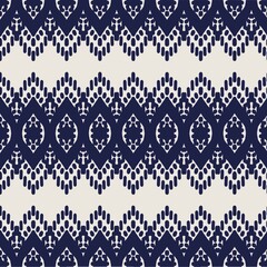 Fototapeta premium Ethnic abstract ikat art. Seamless pattern in tribal, folk embroidery, and Mexican style. Aztec geometric art ornament print.Design for carpet, wallpaper, clothing, wrapping, fabric, cover, textile