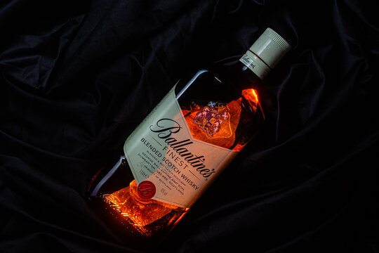 Bottle of Ballantine's Whiskey on dark background