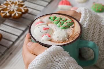 Christmas hot chocolate with snowman marshmallow in the cup