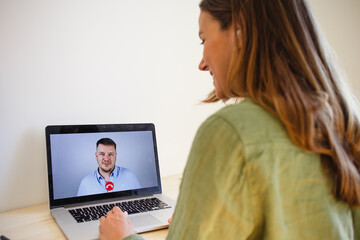 Fototapeta na wymiar Person working from home having a video call