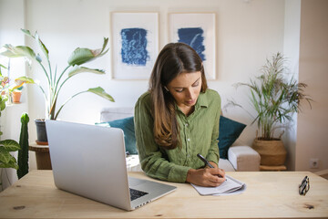 woman working on laptop from home
