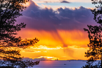 Dramatic winter sky at sunset. Pörkenäs, Finland