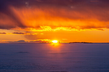 Fototapeta premium Dramatic winter sky at sunset. Pörkenäs, Finland