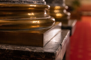 Classic architecture details, brass bases of round pillars