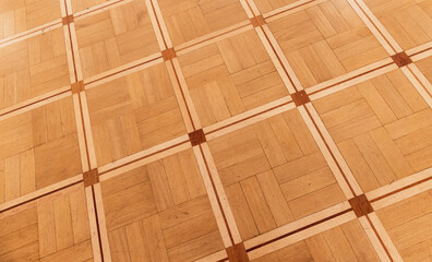 Vintage parquet made of various wood types planks