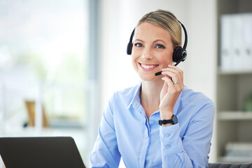 Contact us, customer service and telemarketing call center agent using her laptop and headset in...