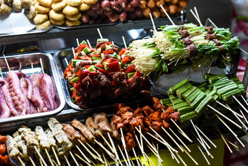 Many snacks and seafood in vietnamese night market in Da Lat