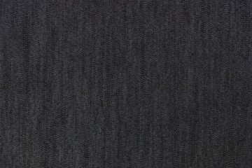 Fototapeta na wymiar Black jeans texture or background, denim textile.