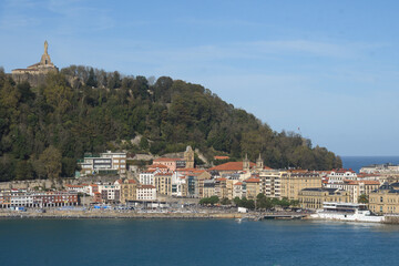 panoramic view of the old town of San Sebastian with Mount Urgul in the background