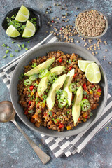 Lentil salad with avocado. Top view with copy space. Healthy food.