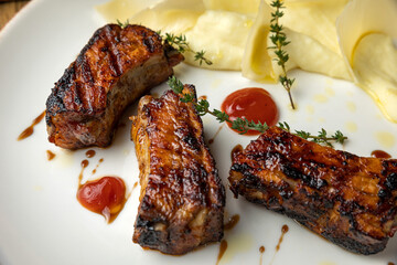 delicious fried ribs in sauce
