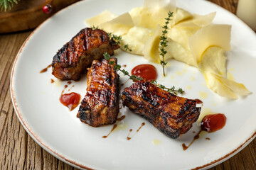 delicious fried ribs in sauce
