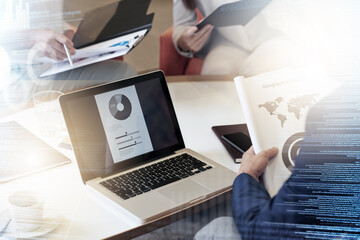 Business people, laptop and analytics working at the office in research or data statistics in double exposure. Employee team in corporate strategy, competitor analysis or marketing in digital overlay