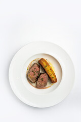 delicious fried steak in sauce in a restaurant
