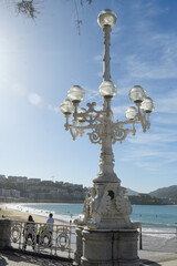 Naklejka premium Lampposts of La Concha promenade in San Sebastian