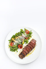 delicious fried steak in sauce in a restaurant
