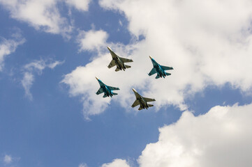 100 years of the Russian Air Force. Formation flight supersonic fighters Su-35 (NATO - Flanker-E)  and front-line supersonic fighter-bombersSu-34 (Fullback) . Zhukovsky, Russia, August 10, 2012