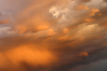 Naklejka na ściany i meble Dramatic sky towards sunset. Sky background.