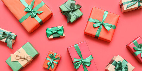 Many Christmas gifts on red background, flat lay