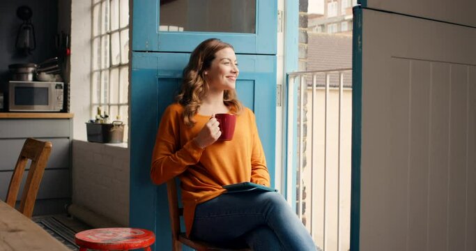 Woman, coffee and happiness while thinking about freedom, future and relax at apartment door with a smile and positive mindset. Happy female at home with tea for peace, calm and free time inspiration