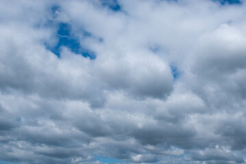 White clouds against a blue sky