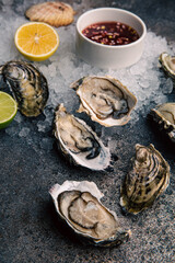 Oyster plate with lemon and oyster sauce