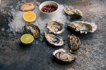 Oyster plate with lemon and oyster sauce