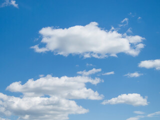 Obraz na płótnie Canvas White clouds against a blue sky