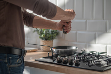 Man cooking something in the kitchen