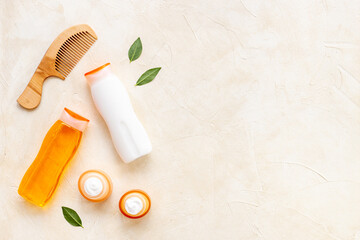 Flat lay of hair care and styling products, top view