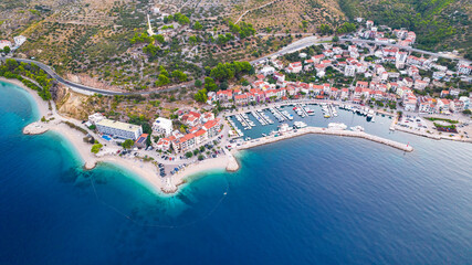 Beautiful coastline on the Riviera Makarska on Adriatic sea in Croatia, tourist resorts and beach, overhead view