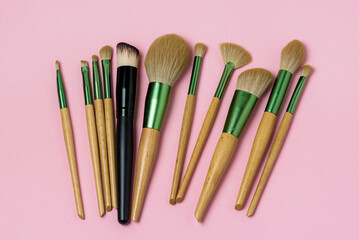 Set of Makeup Brushes on Pink Background Minimal Flat Lay Horizontal