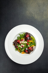 a delicious salad in a restaurant
