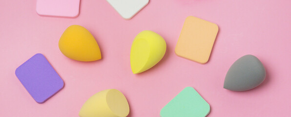 Colored Make up Egg Make up Sponge Puff make up Ugg Makeup Tool Concept Pink Background Long