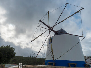 Traditional blue white portuguese windmill in Odeceixe, Costa Vicentina, Portugal.