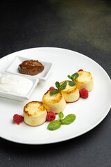 delicious cheesecakes with sour cream in a restaurant
