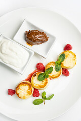 delicious cheesecakes with sour cream in a restaurant
