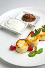 delicious cheesecakes with sour cream in a restaurant
