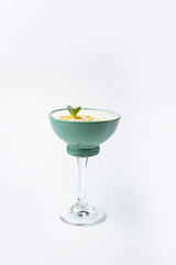 the cocktail is prepared by the bartender in the restaurant
