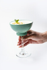 the cocktail is prepared by the bartender in the restaurant
