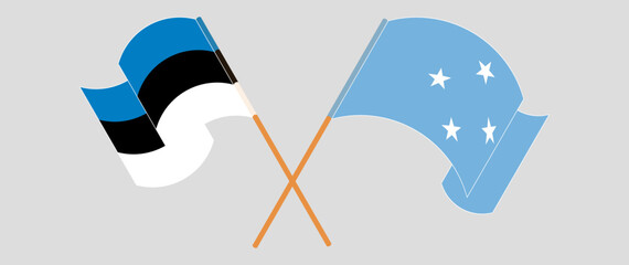 Crossed and waving flags of Estonia and Micronesia