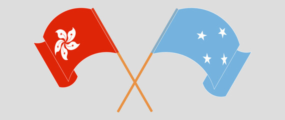 Crossed and waving flags of Hong Kong and Micronesia