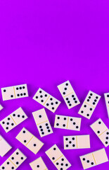 White dominoes on a purple background