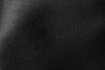 Obraz premium Black and white fabric texture of silk. Macro photo zoom.