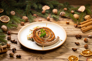 Christmas wine sausage served with potato salad