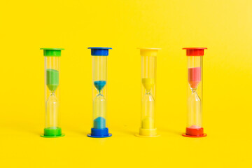 hourglass on the table, sand clock as time passing concept for business deadline, copy space